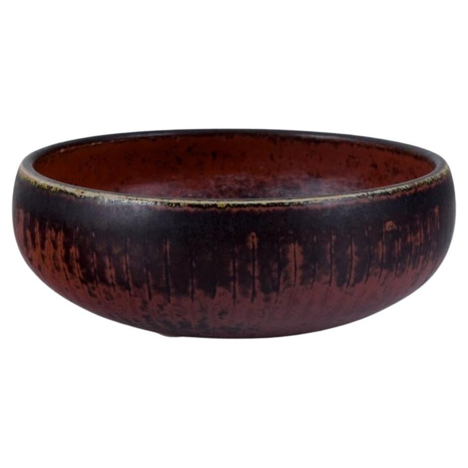 Carl Harry Stålhane for Rörstrand, ceramic bowl with glaze in brown tones.  For Sale