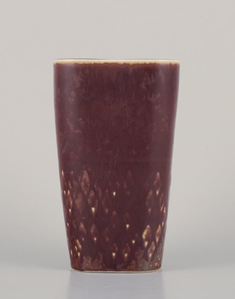 Carl Harry Stålhane for Rörstrand. Ceramic vase in brown tones.
Modernist design.
Mid-20th century.
Marked.
In perfect condition.
Second factory quality.
Dimensions: W 10.5 cm x D 7.0 cm x H 17.5 cm.