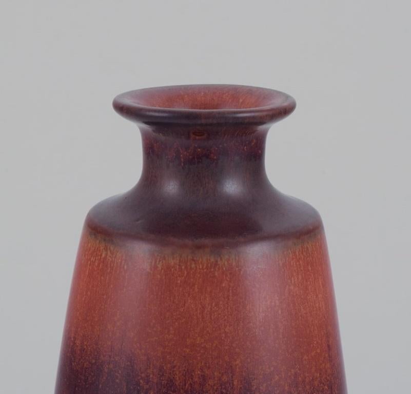 Scandinavian Modern Carl Harry Stålhane for Rörstrand. Ceramic vase with glaze in brown shades For Sale
