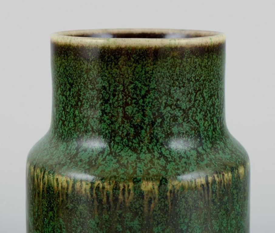 Swedish Carl Harry Stålhane for Rörstrand. Ceramic vase with green-brown glaze. For Sale
