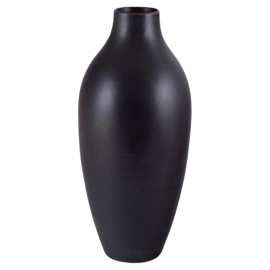 Carl Harry Stålhane for Rörstrand. Colossal Ceramic Floor Vase with Brown Glaze