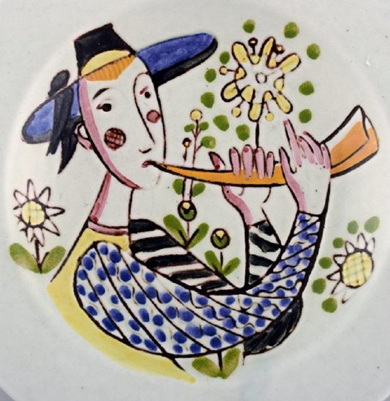 Carl-Harry Stålhane for Rörstrand. Hand painted bowl in glazed stoneware decorated with man in field, 1960s.
Measures: 18 x 3 cm.
In very good condition.
Signed.