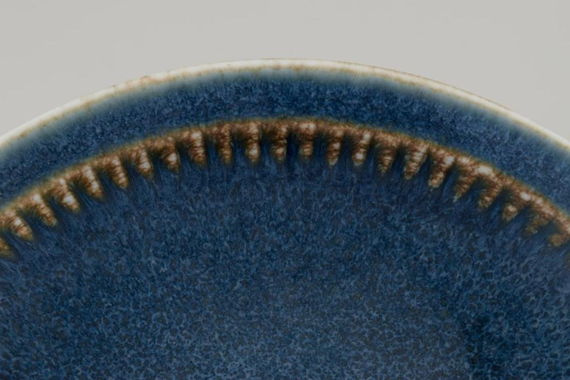 Carl Harry Stålhane for Rörstrand. Large ceramic bowl. Glazed in blue shades. In Excellent Condition In Copenhagen, DK