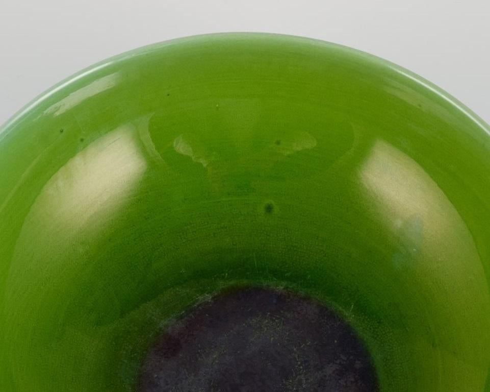 Swedish Carl Harry Stålhane for Rörstrand. Large ceramic bowl in apple green glaze For Sale
