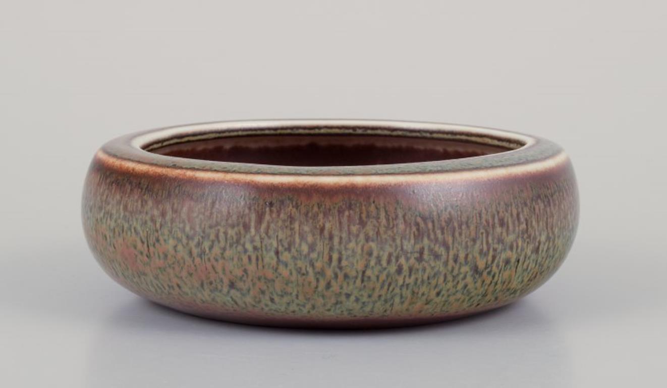 Scandinavian Modern Carl Harry Stålhane for Rörstrand. Low ceramic bowl with brown and green glaze. For Sale
