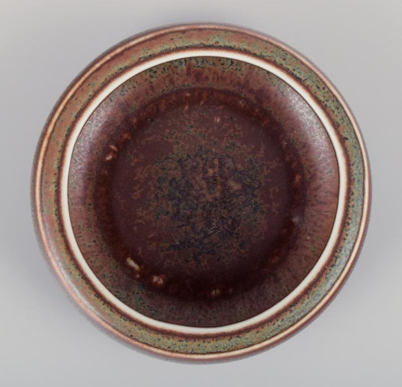 Swedish Carl Harry Stålhane for Rörstrand. Low ceramic bowl with brown and green glaze. For Sale