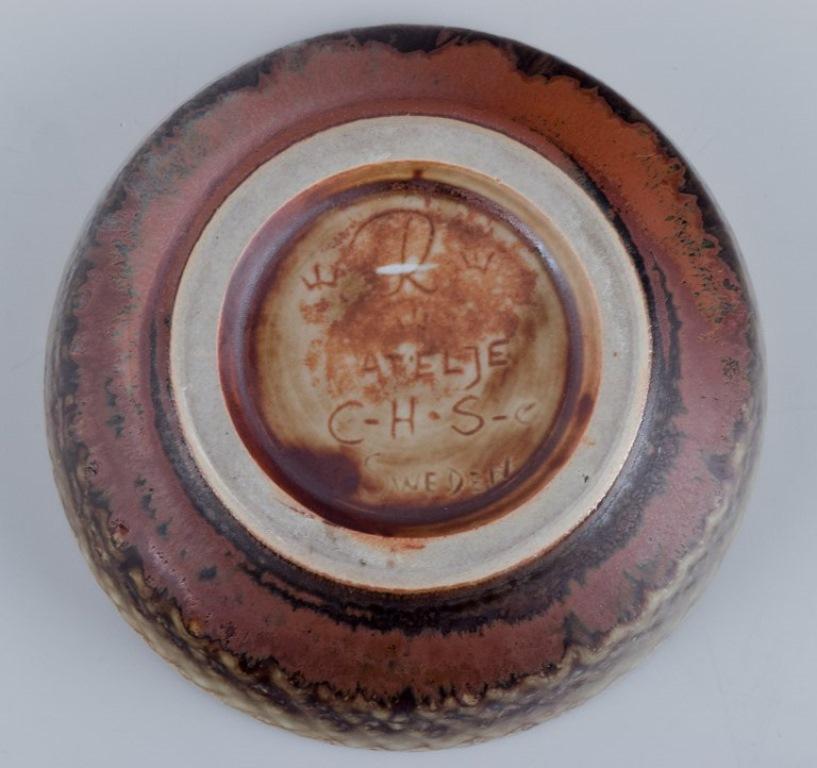 Glazed Carl Harry Stålhane for Rörstrand. Miniature ceramic bowl in brown tones. For Sale