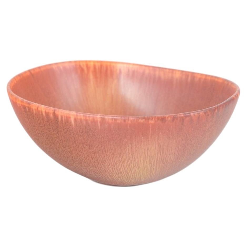 Carl-Harry Stålhane for Rörstrand. Organically shaped bowl with warm rose glaze. For Sale