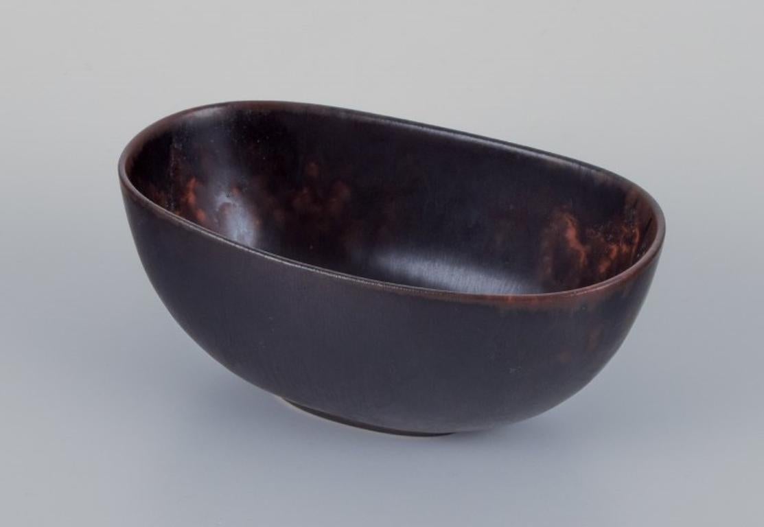 Scandinavian Modern Carl Harry Stålhane for Rörstrand. Small ceramic bowl in dark brown shades.  For Sale