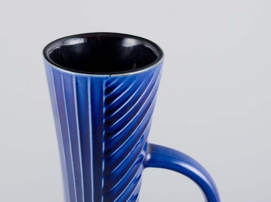 Swedish Carl Harry Stålhane for Rörstrand. Tall and slim ceramic pitcher / vase For Sale