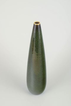 Carl-Harry Stålhane for Rörstrand. Tall ceramic vase with deep green glaze.