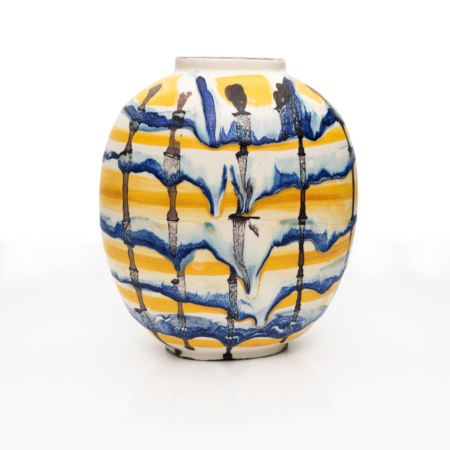 A hand decorated glazed vase by artist Carl-Harry Stalhane for Rorstrand, Sweden. The vase has a loose grid pattern with blue, yellow and dark brown/black on a white ground. Signed and dated on the bottom “43”. 

Measures: Height 9.5”, width 8”,