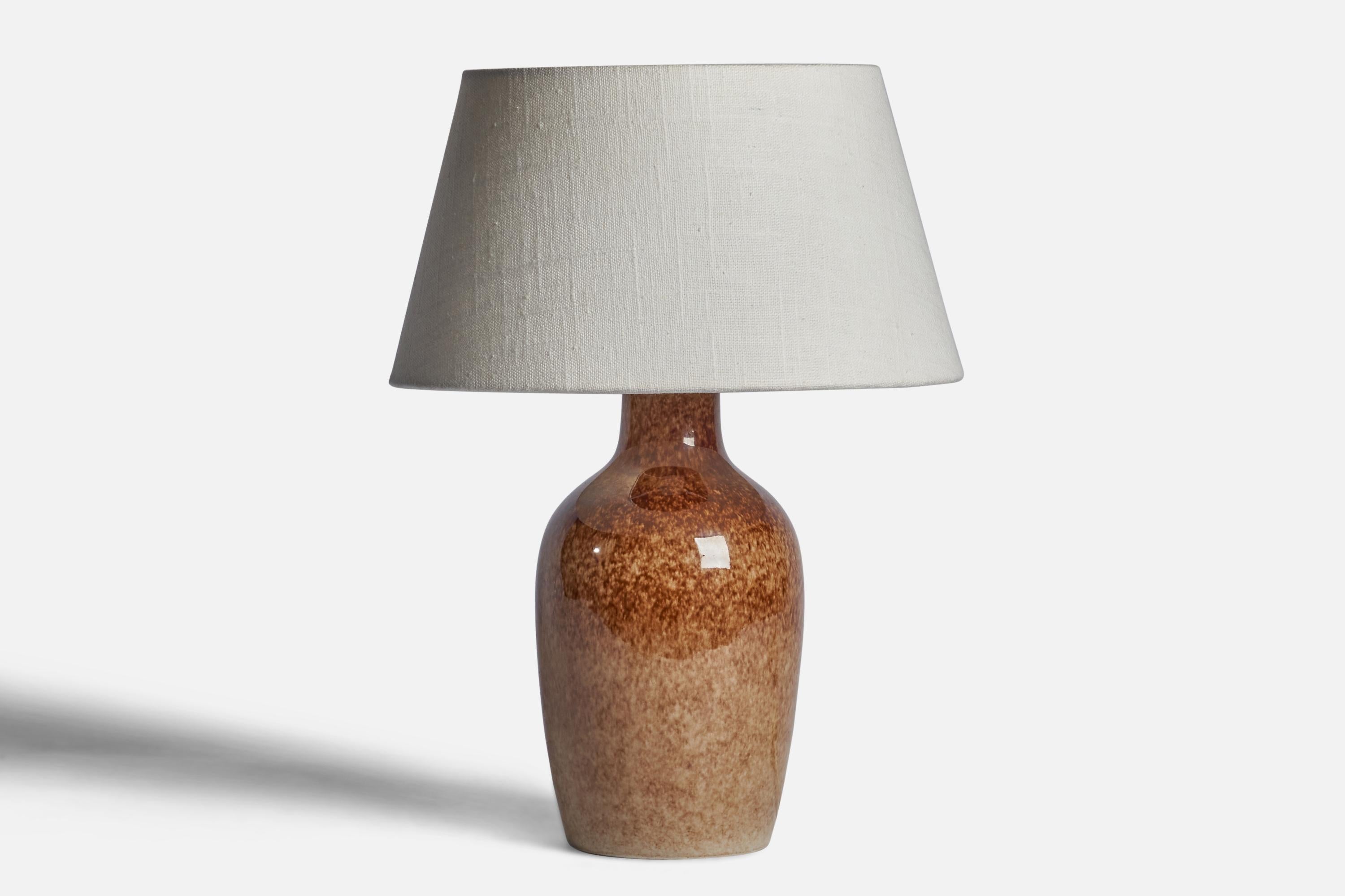 A table lamp designed by Carl-Harry Stålhane and Kent Ericsson, produced by Designhuset, Sweden, 1960s.

Dimensions of Lamp (inches): 10.75” H x 4.75” Diameter
Dimensions of Shade (inches): 7” Top Diameter x 10” Bottom Diameter x 5.5” H 
Dimensions