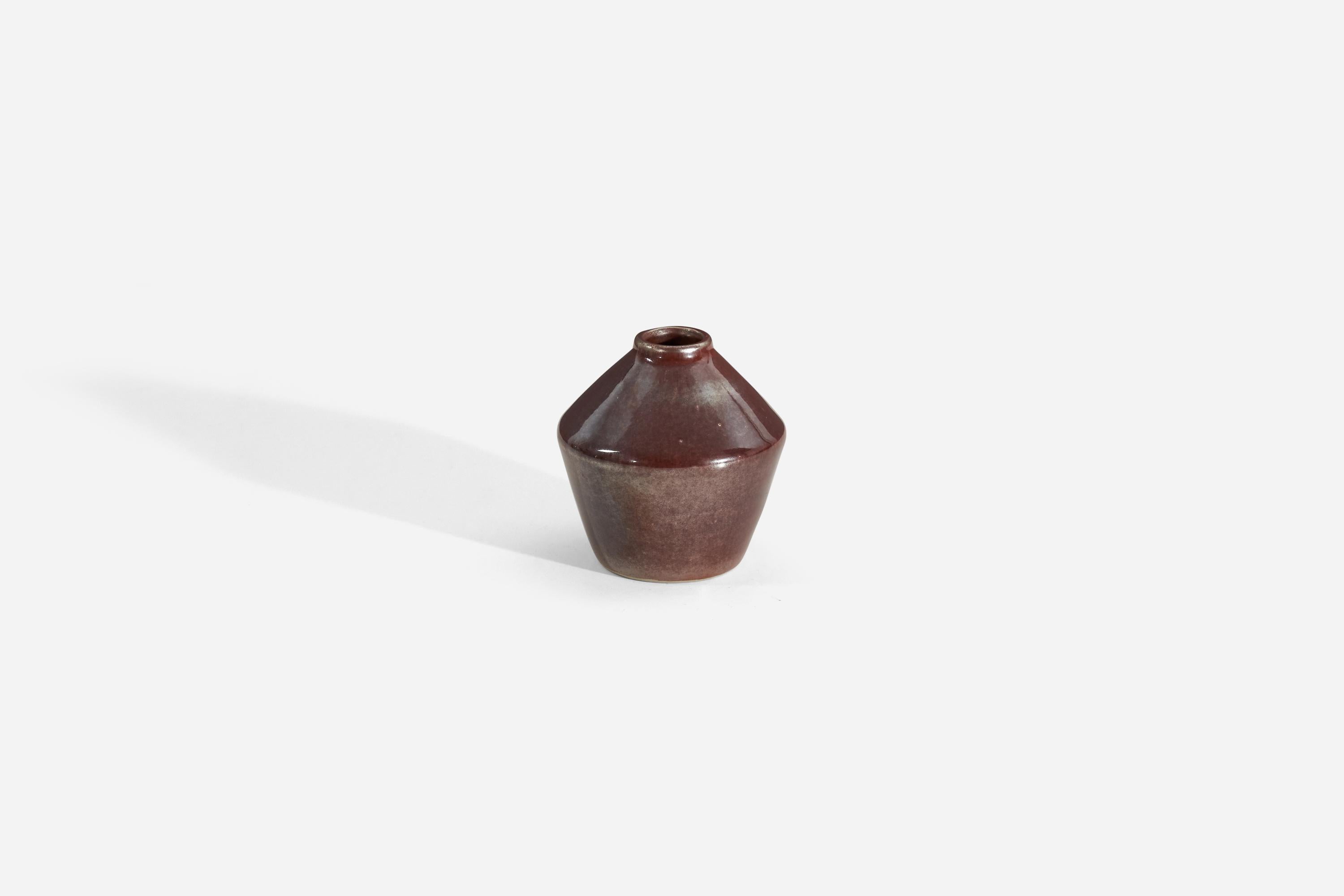 A reddish-brown glazed stoneware vase designed and produced by Carl-Harry Stålhane. Produced by Rörstrand, Sweden, 1960s.