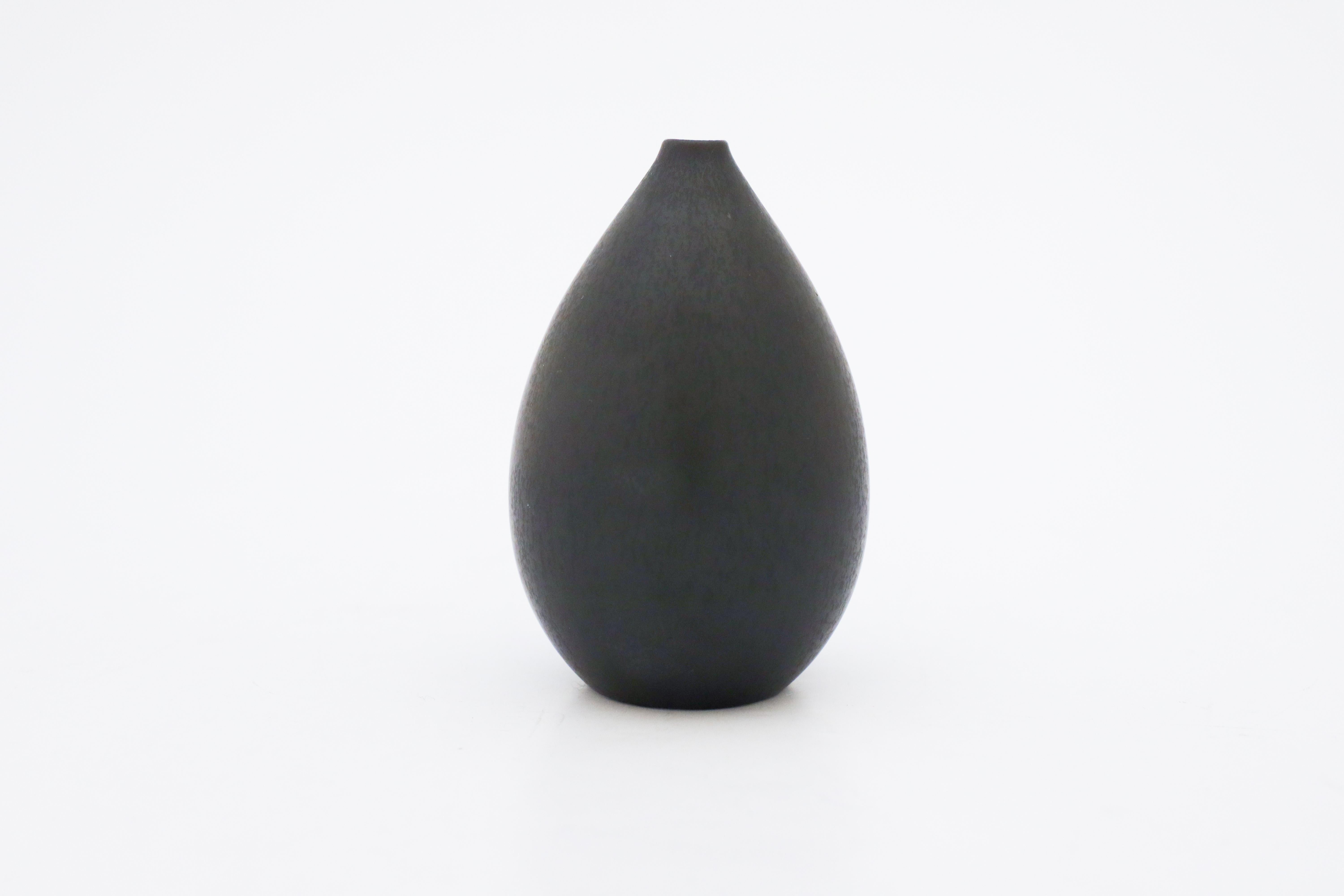A beautiful midcentury Swedish vase in stoneware by Rörstrand, designed by Carl-Harry Stålhane.