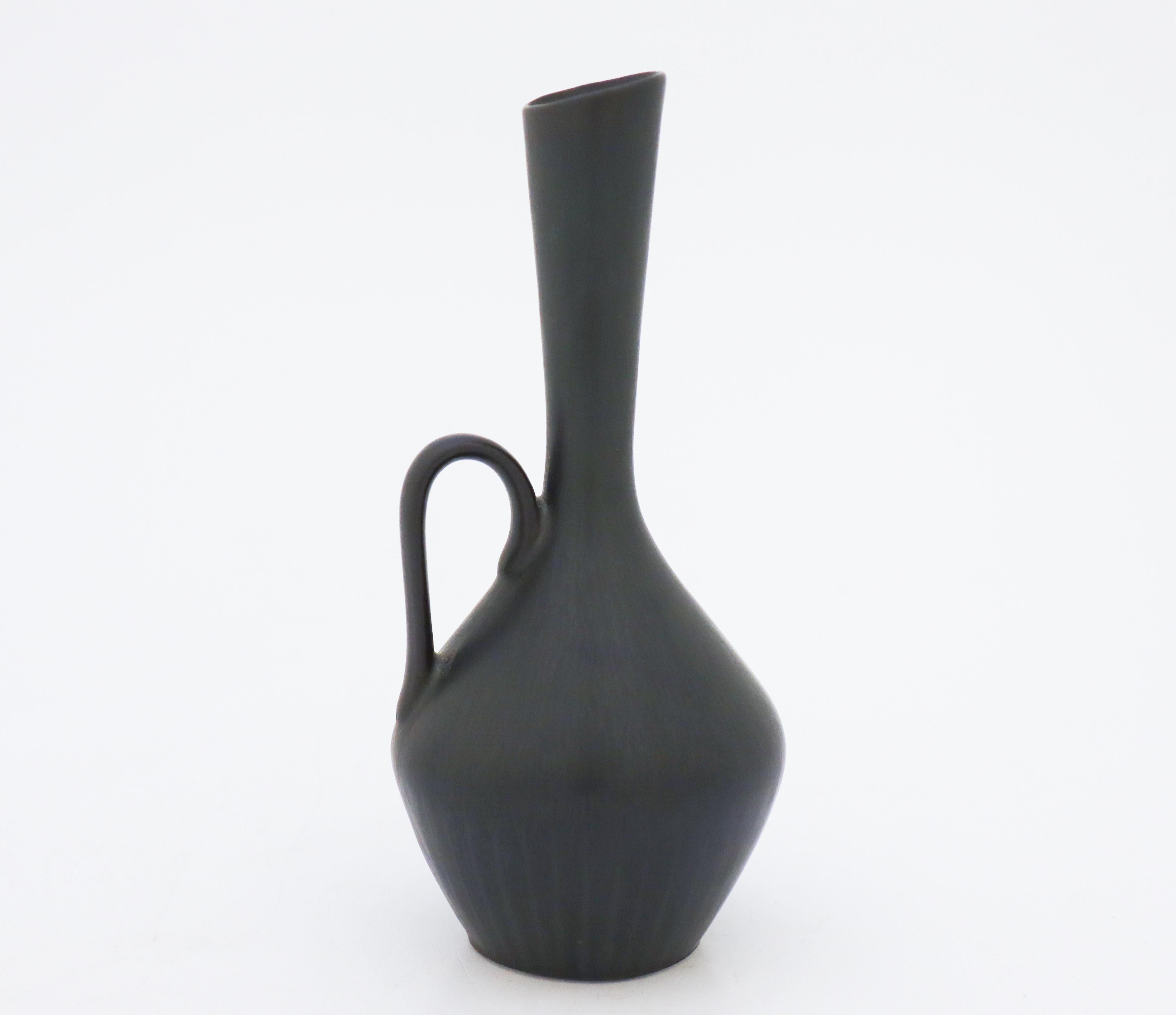 A beautiful midcentury Swedish vase in stoneware by Rörstrand, designed by Carl-Harry Stålhane.