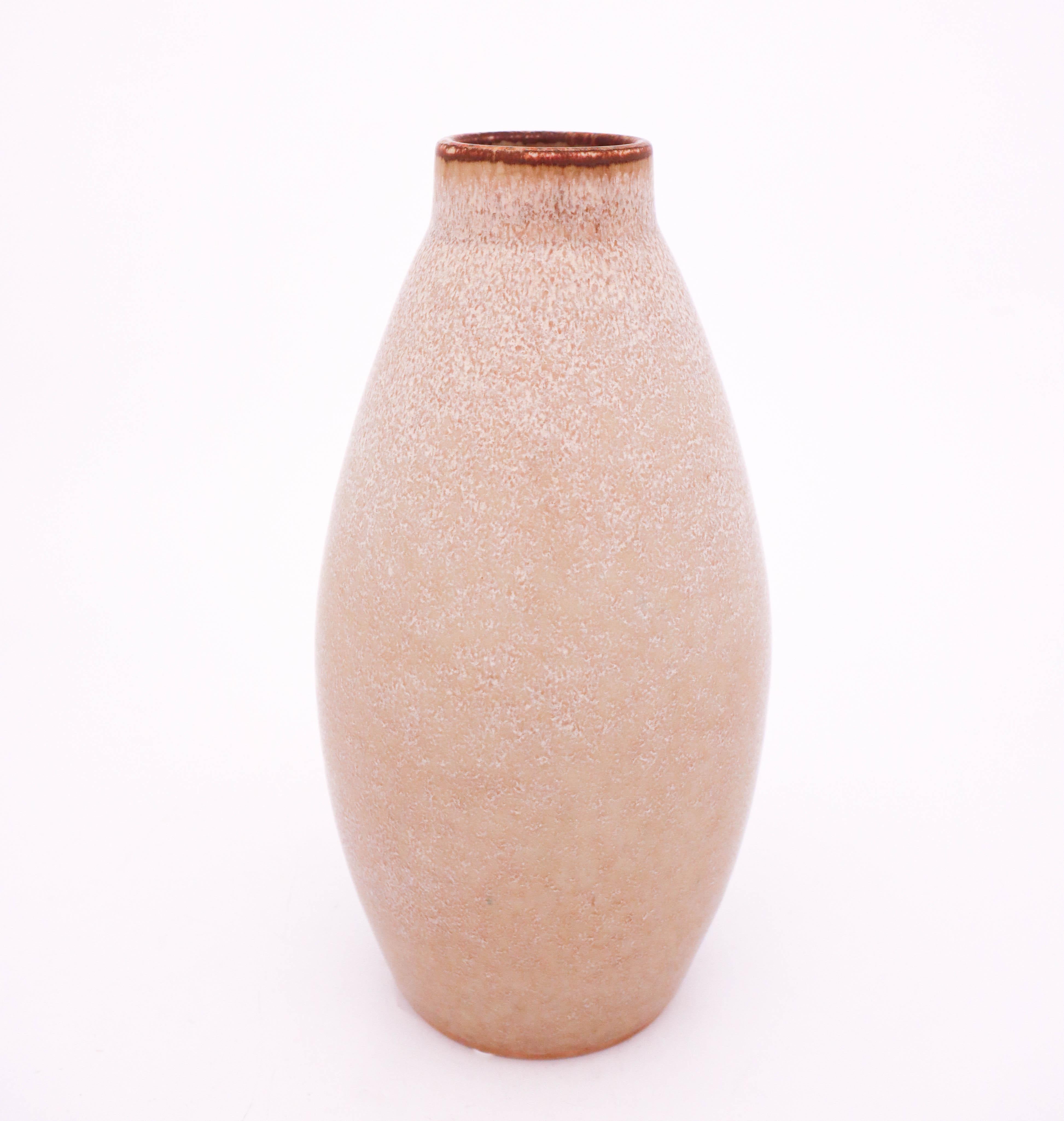 Midcentury Swedish vase in stoneware by Rörstrand, designed by Carl-Harry Stålhane. This large and unique vase was produced in 1963.