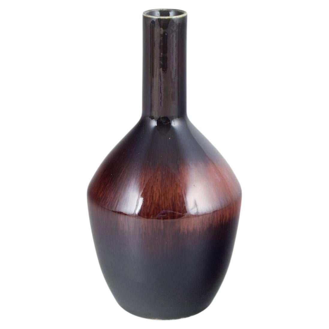 Carl-Harry Stålhane, Rörstrand. Vase with slender neck and hare's fur glaze For Sale