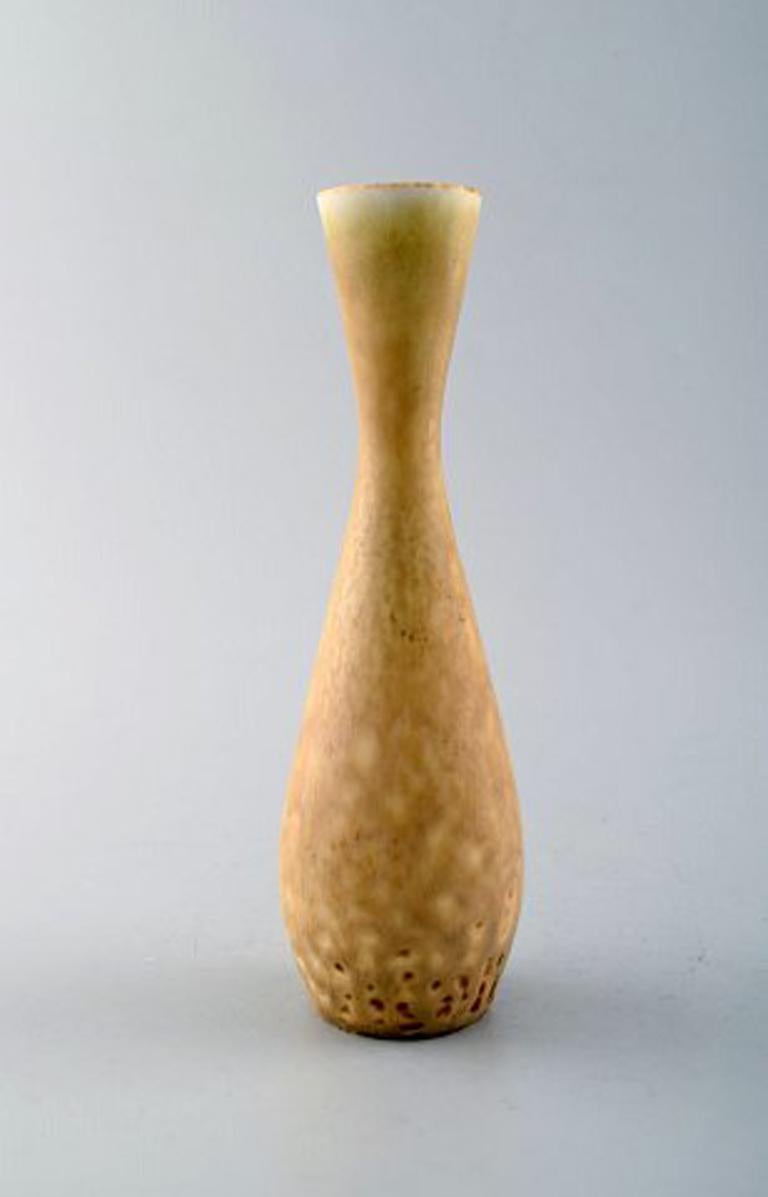 Carl-Harry Stålhane, Rørstrand, slim ceramic vase.
Beautiful glaze in light brown shades.
Measures: 17.5 x 5.5 cm.
In very good condition.
1. Factory quality.