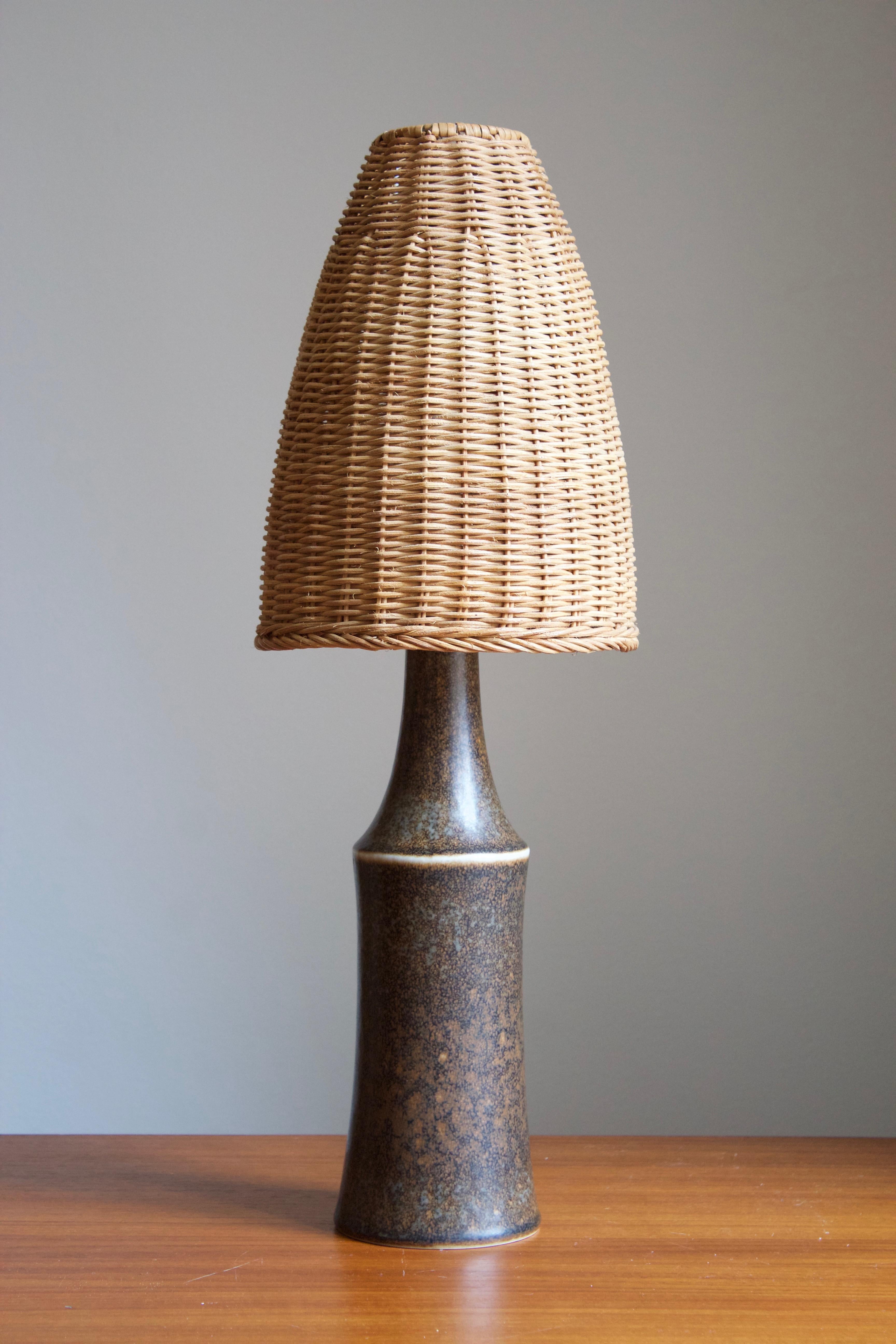 A table lamp by Carl-Harry Stålhane for the iconic Swedish firm Rörstrand. 

Stated dimensions exclude lampshades. Height includes socket. Lampshade illustrated can be included in purchase upon request. 

Other ceramicists of the period include
