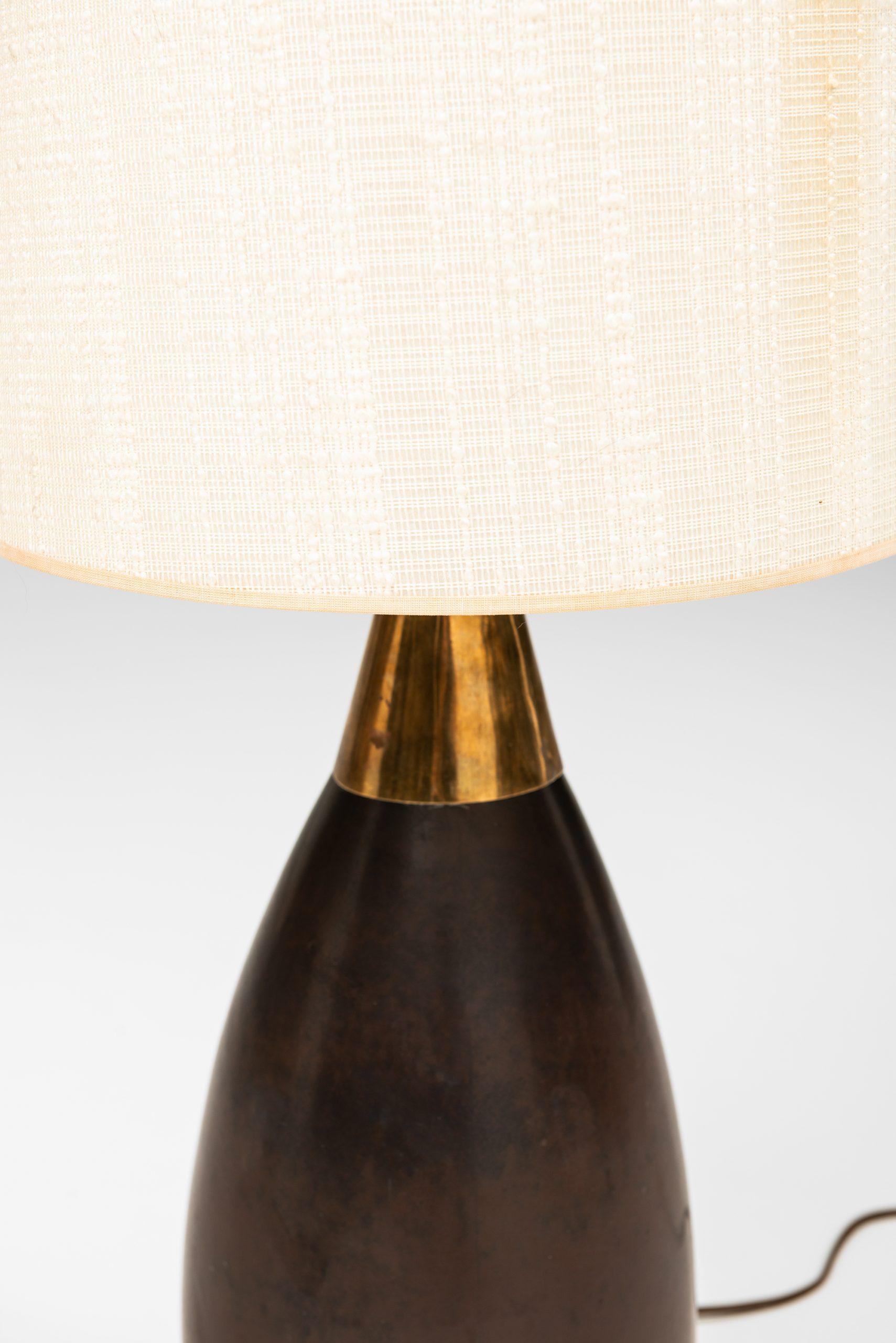 Ceramic table lamp designed by Carl-Harry Stålhane. Produced by Rörstrand in Sweden.
