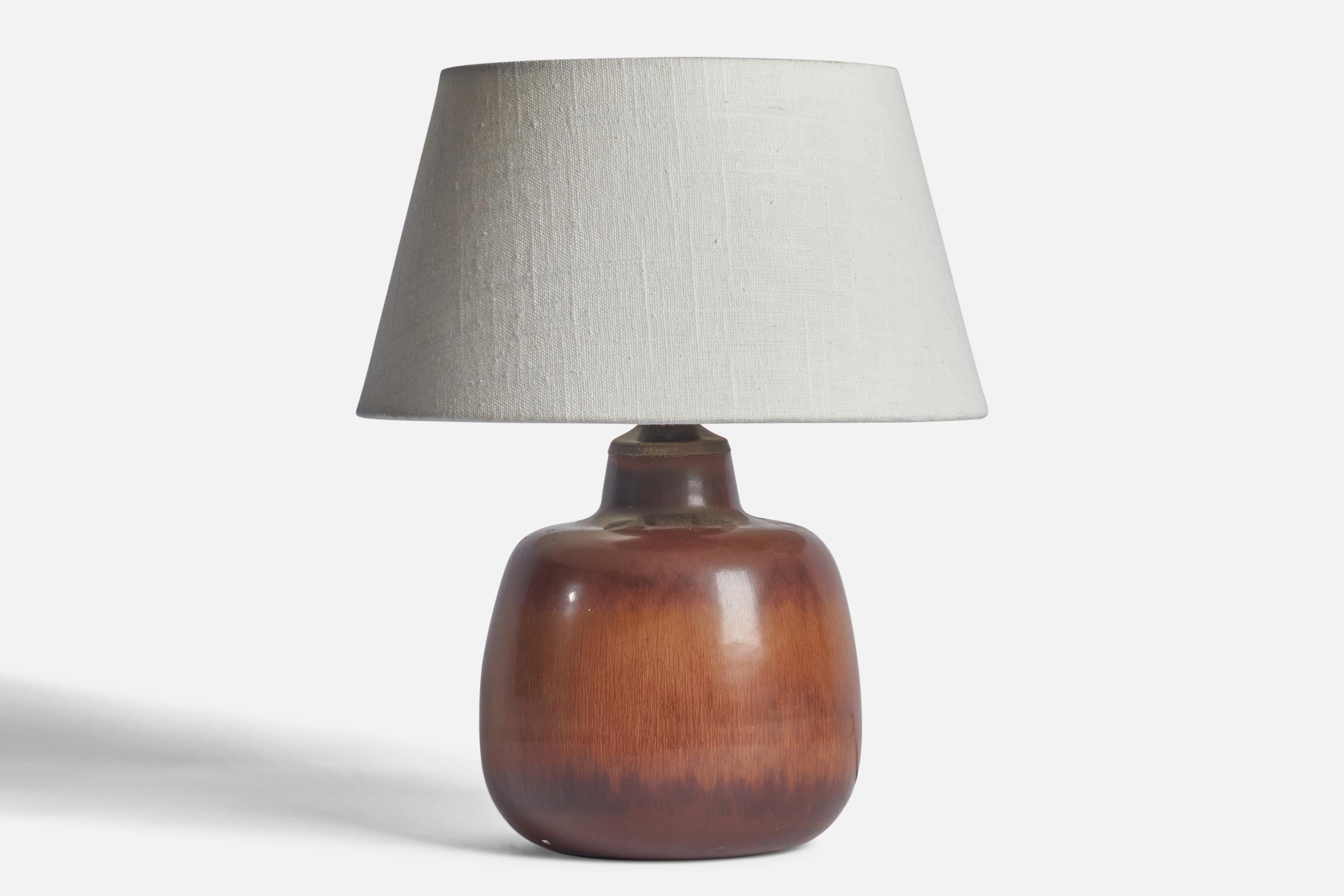 A brown-glazed stoneware table lamp designed by Carl-Harry Stålhane and produced by Rörstrand, Sweden, 1950s.

Dimensions of Lamp (inches): 9.25