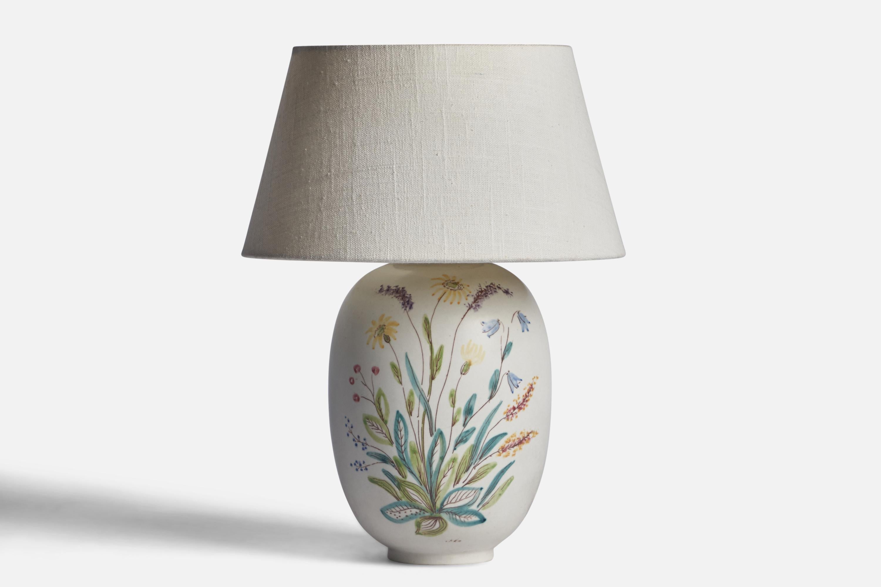 A white-glazed and hand-painted stoneware table lamp designed by Carl-Harry Stålhane and produced by Rörstrand, Sweden, 1950s.

Dimensions of Lamp (inches): 10.65” H x 5.75” Diameter
Dimensions of Shade (inches): 7” Top Diameter x 10” Bottom