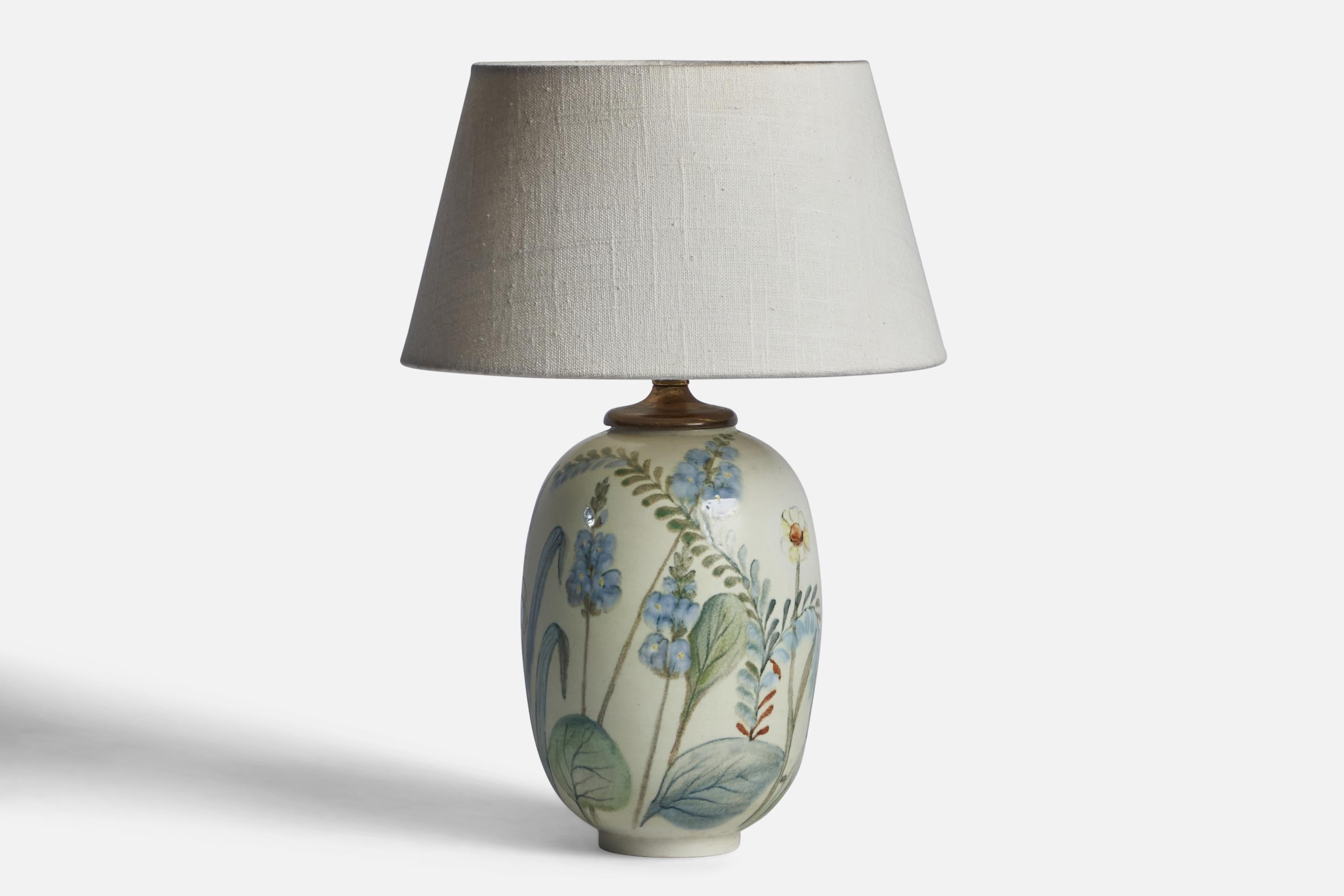 A white-glazed and hand-painted stoneware table lamp designed by Carl-Harry Stålhane and produced by Rörstrand, Sweden, 1950s.

Dimensions of Lamp (inches): 11.5” H x 5.45” Diameter
Dimensions of Shade (inches): 7” Top Diameter x 10” Bottom Diameter