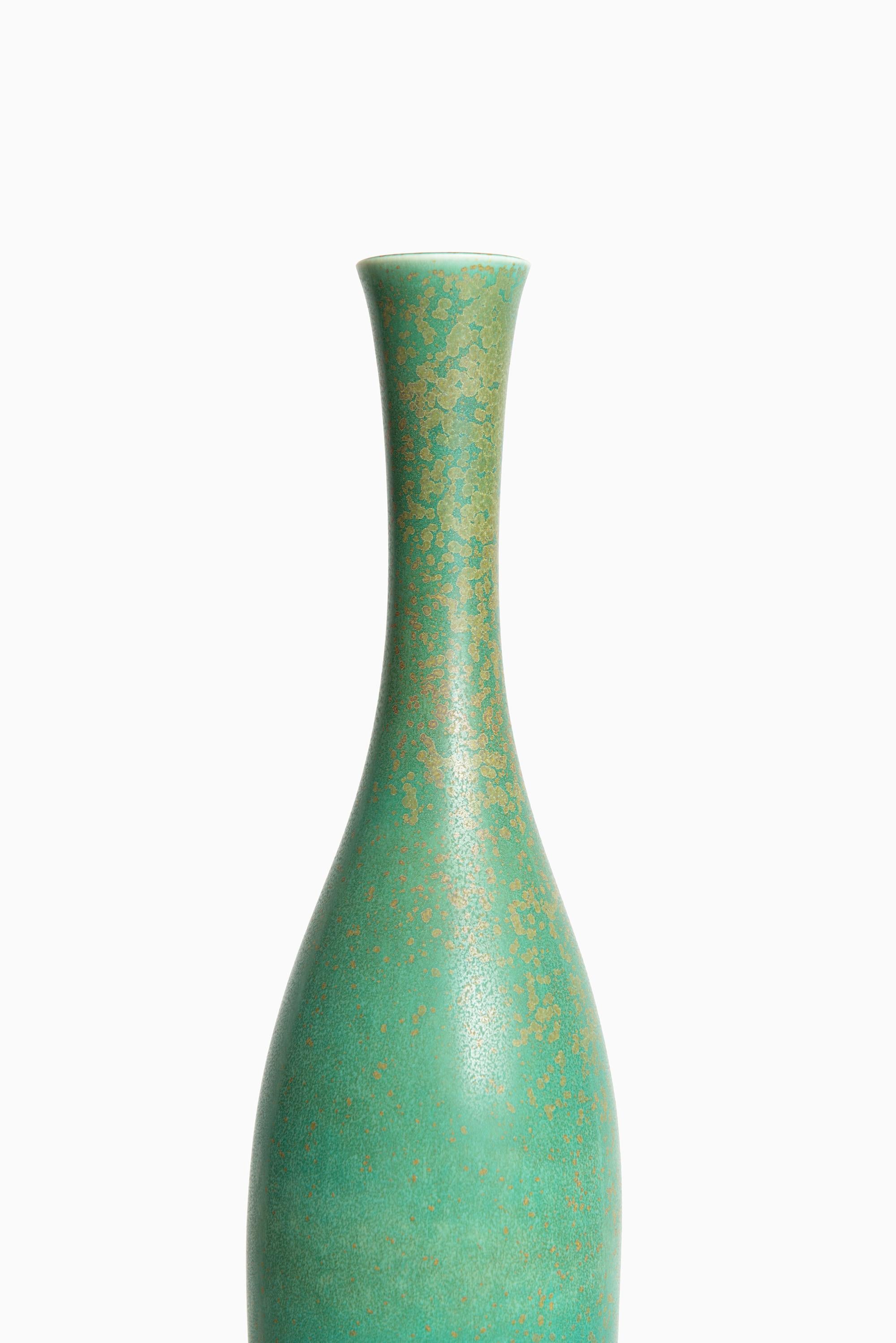 Rare and tall ceramic vase designed by Carl-Harry Stålhane. Produced by Rörstrand in Sweden.