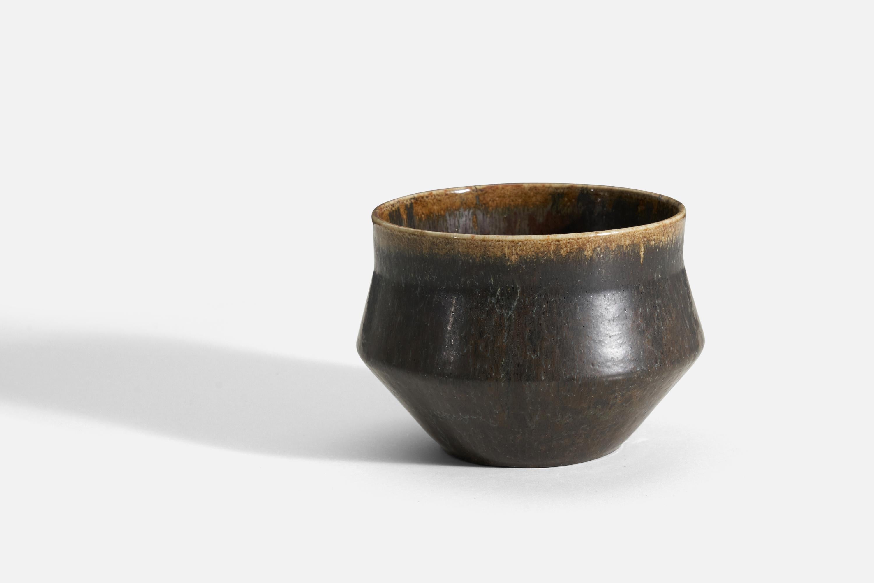 A glazed stoneware bowl designed by Carl-Harry Stålhane for Rörstrand, Sweden, 1960s. The stamp and signature on the underside indicate the bowl is unique.