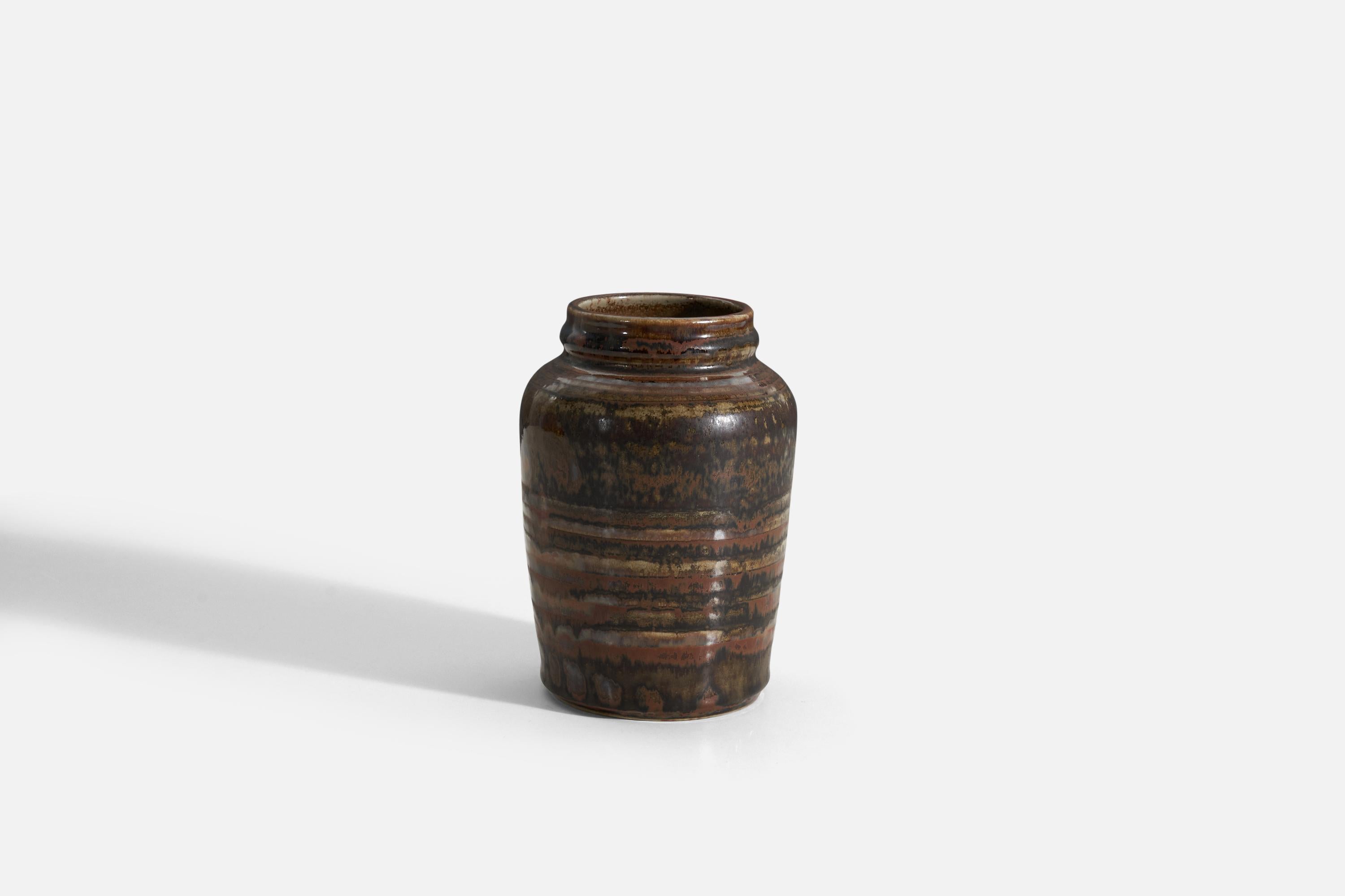 A brown glazed stoneware vase designed by Carl-Harry Stålhane and Produced by Rörstrand, Sweden, 1960s.