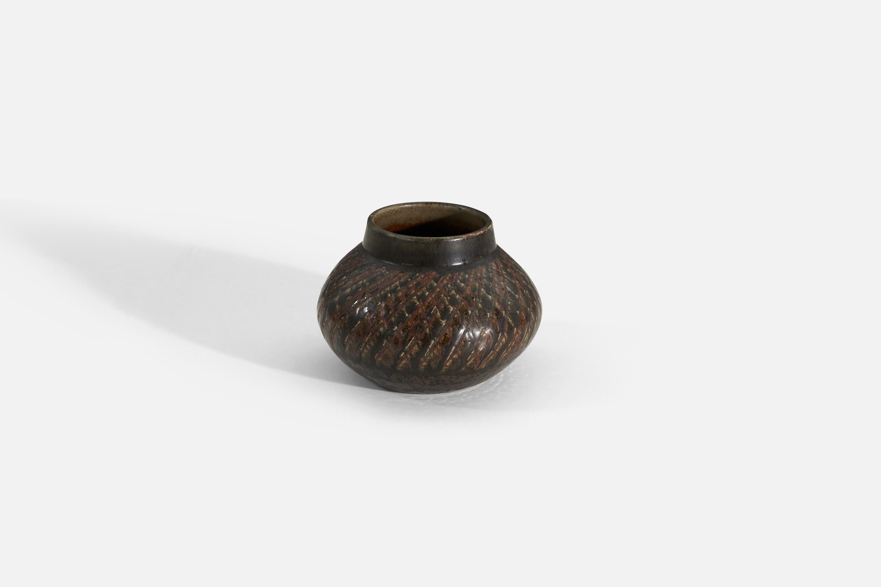 A brown glazed stoneware vase designed and produced by Carl-Harry Stålhane. Produced by Rörstrand, Sweden, 1960s.