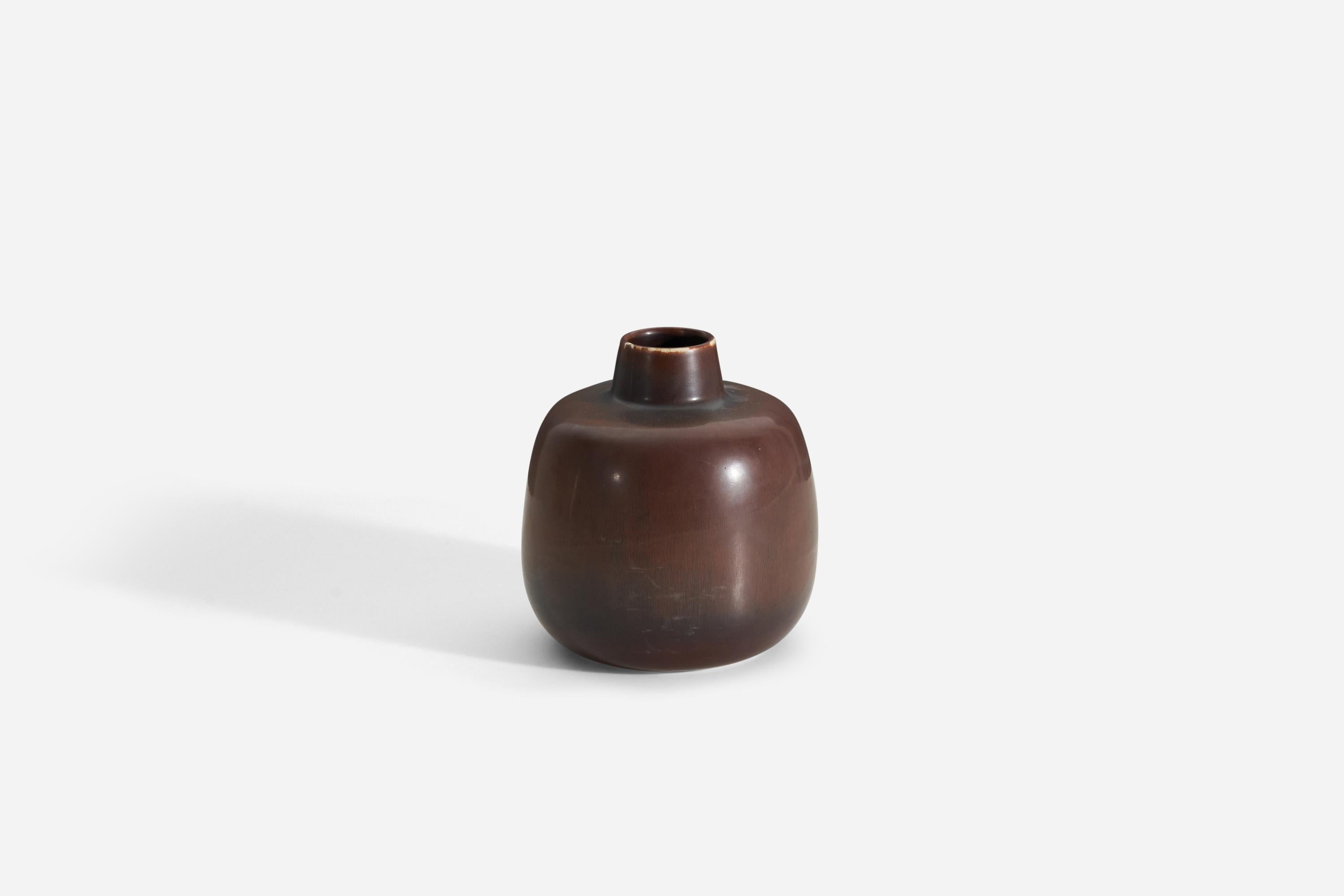A vase by Carl-Harry Stålhane for Swedish firm Rörstrand, 1950s, Sweden. Marked and signed.

Other ceramicists of the period include Berndt Friberg, Axel Salto, Arne Bang and Wilhelm Kåge.