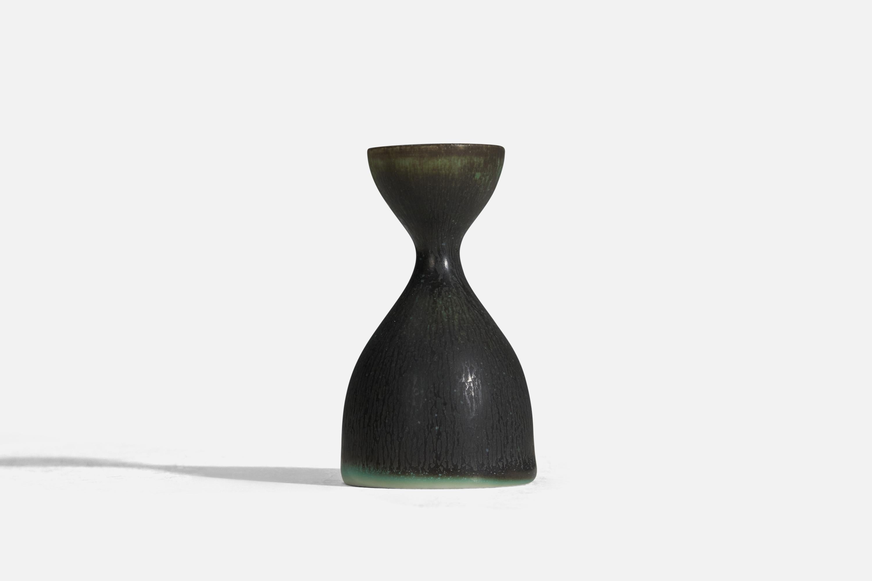 A green and black glazed stoneware vase designed by Carl-Harry Stålhane and produced by Rörstrand, Sweden, 1960s.
