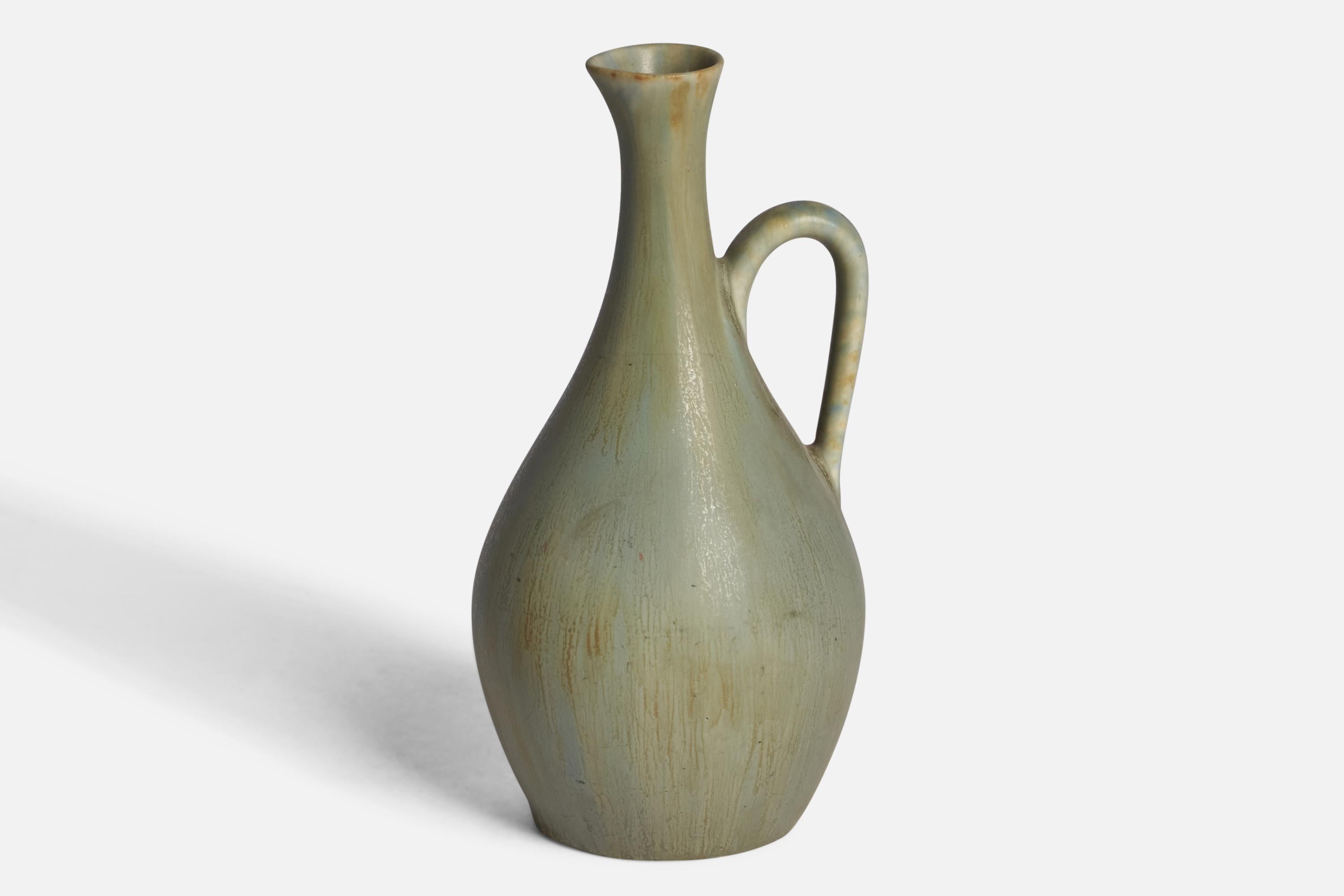 A green stoneware vase or pitcher designed by Carl-Harry Stålhane and produced by Rörstrand, Sweden, 1950s.