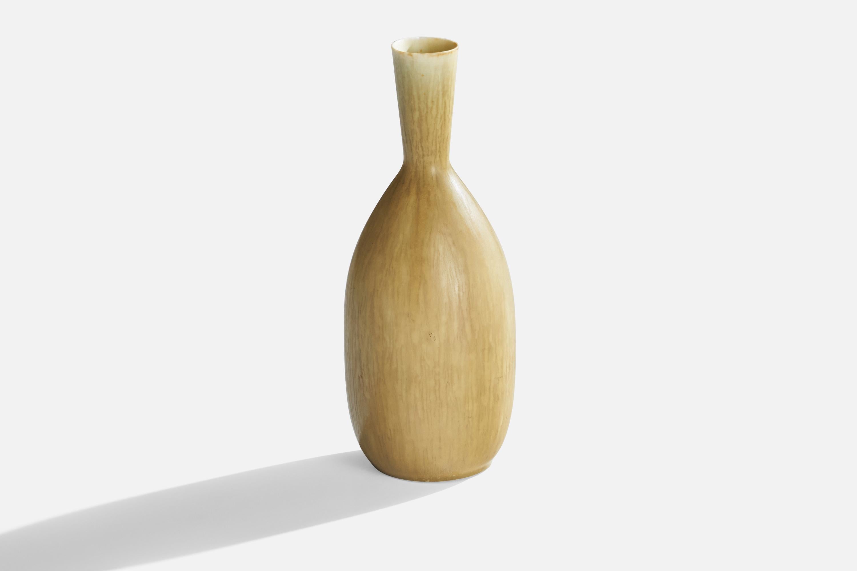 A beige-glazed stoneware vase designed by Carl-Harry Stålhane and produced by Rörstrand, Sweden, 1950s.
