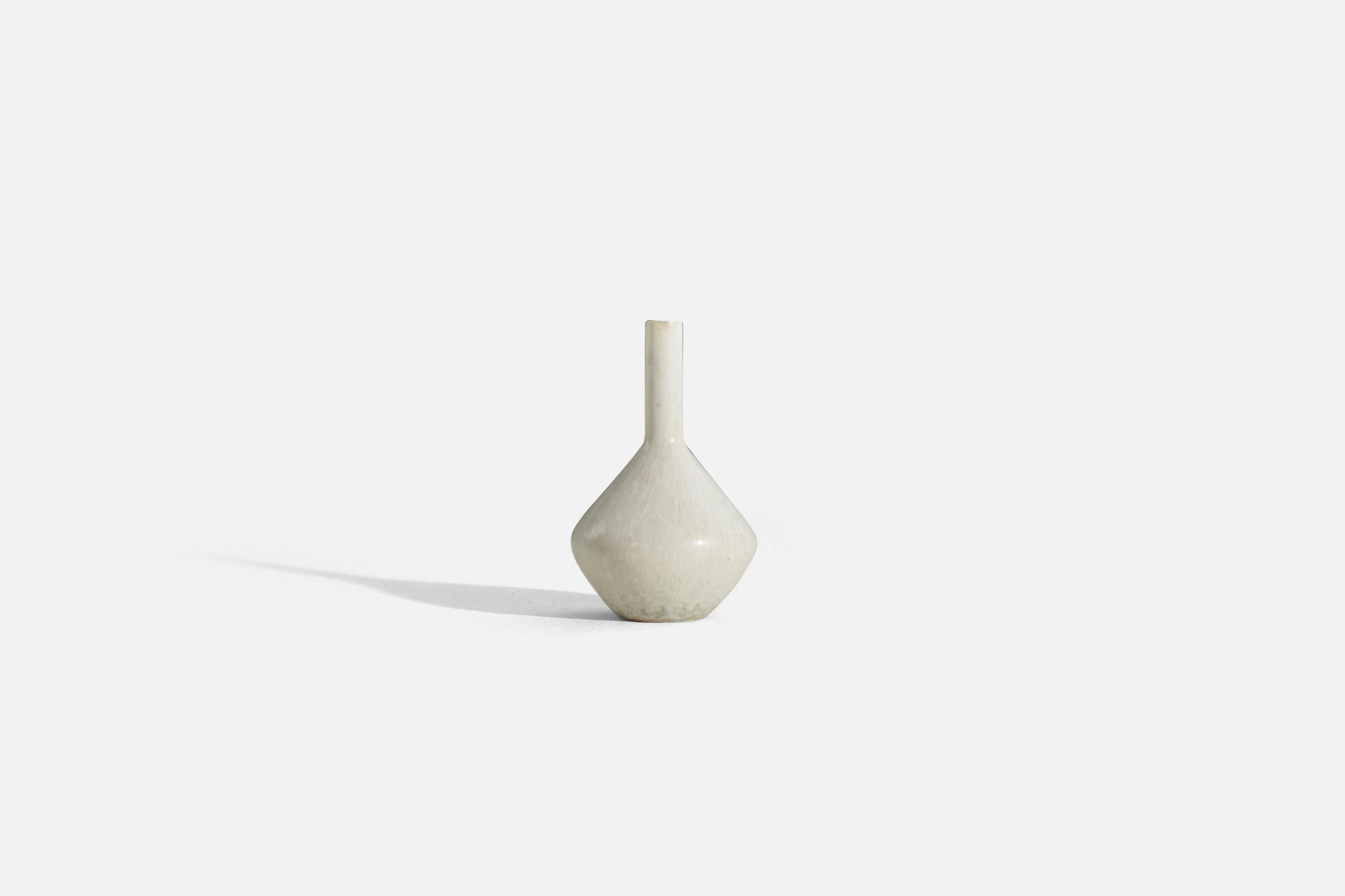 A white-glazed stoneware vase designed by Carl-Harry Stålhane and produced by Rörstrand, Sweden, 1960s.