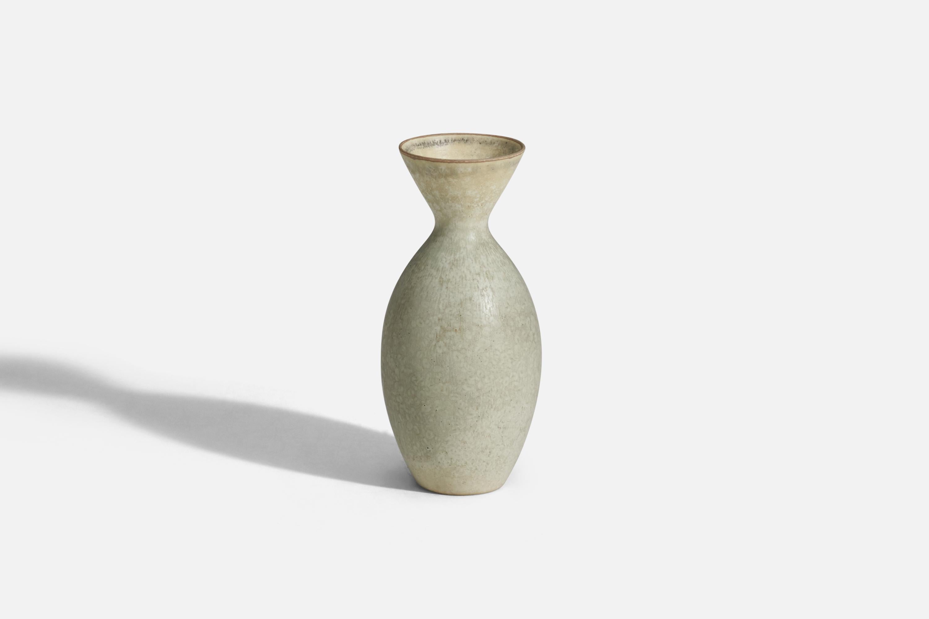 A white glazed stoneware vase designed by Carl-Harry Stålhane and produced by Rörstrand, Sweden, 1960s.