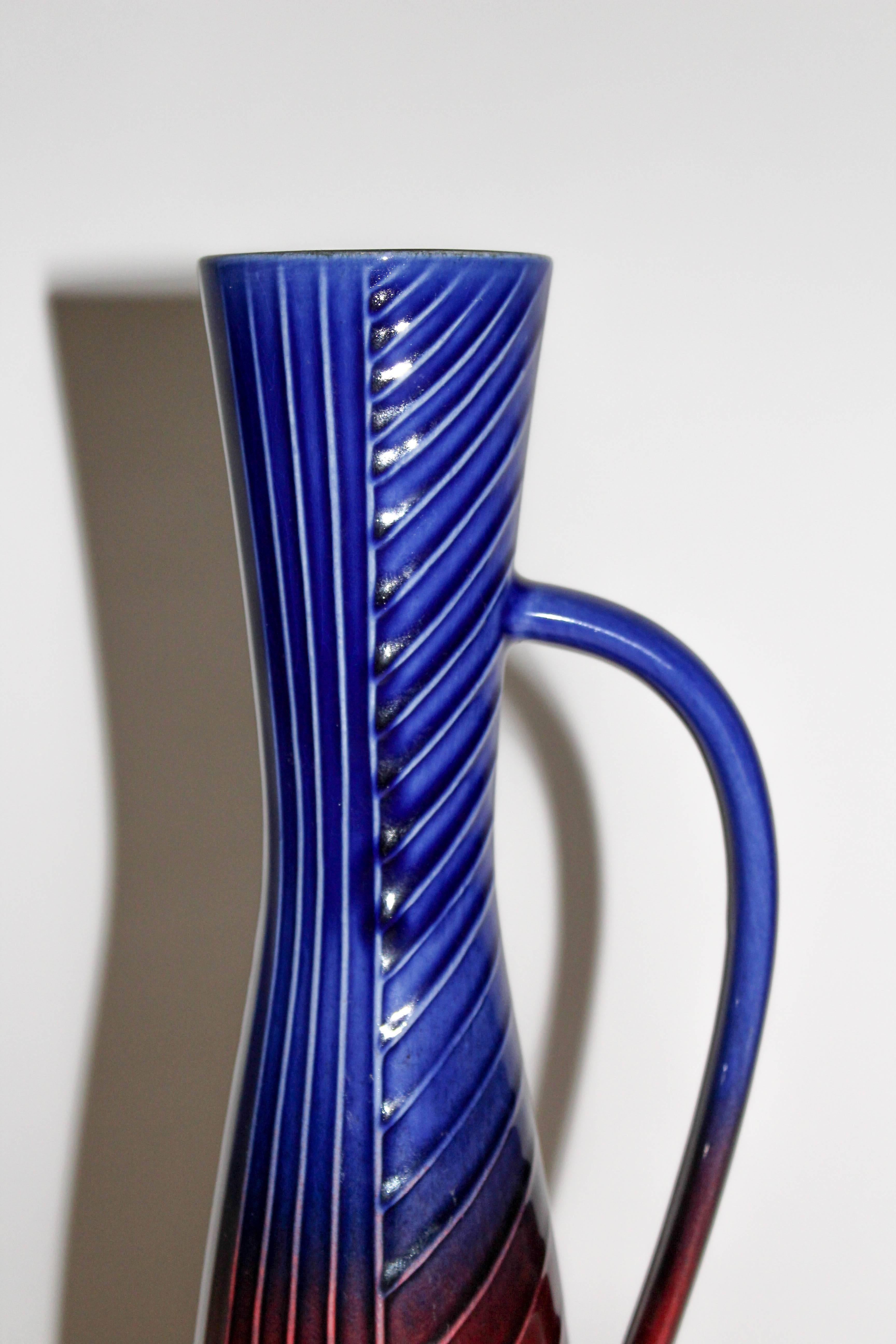Midcentury ceramic vase by Swedish designer Carl Harry Stålhane produced by Rörstrand. The vase is in excellent vintage condition.