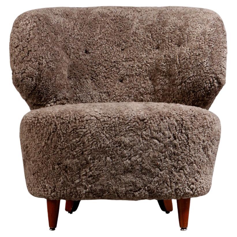 Sedia finlandese curva in pelle di pecora del Sahara di Carl-Johan Boman, anni
40