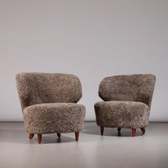 Carl-Johan Boman Pair of Finnish Curved Easy Chairs in Sahara Sheepskin, 1940s