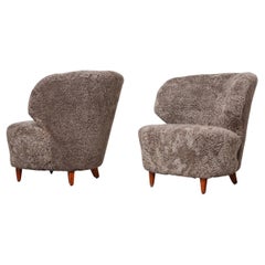 Carl-Johan Boman Pair of Finnish Curved Easy Chairs in Sahara Sheepskin, 1940s