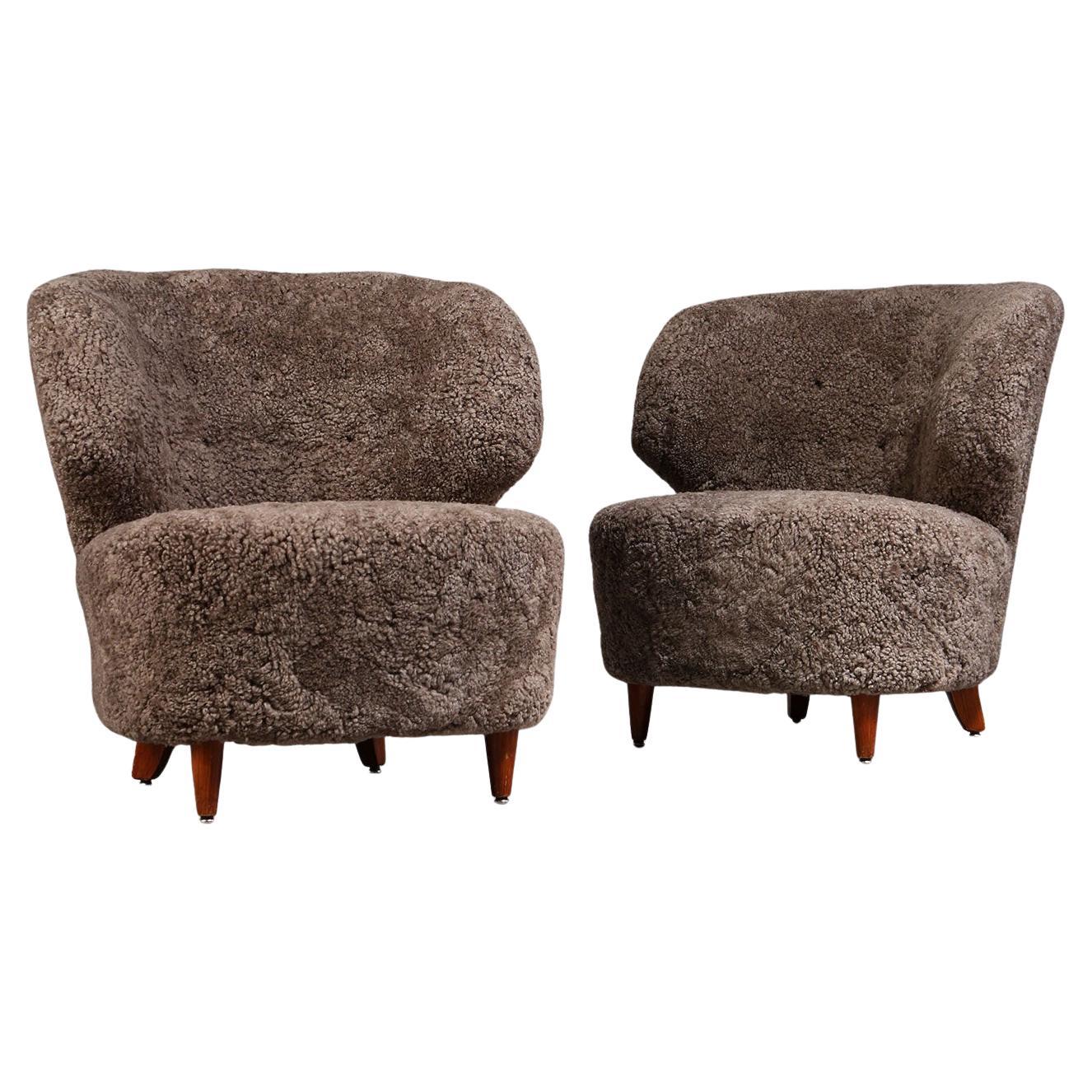 Carl-Johan Boman Pair of Finnish Curved Easy Chairs in Sahara Sheepskin, 1940s