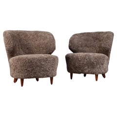 Carl-Johan Boman Pair of Finnish Curved Easy Chairs in Sahara Sheepskin, 1940s