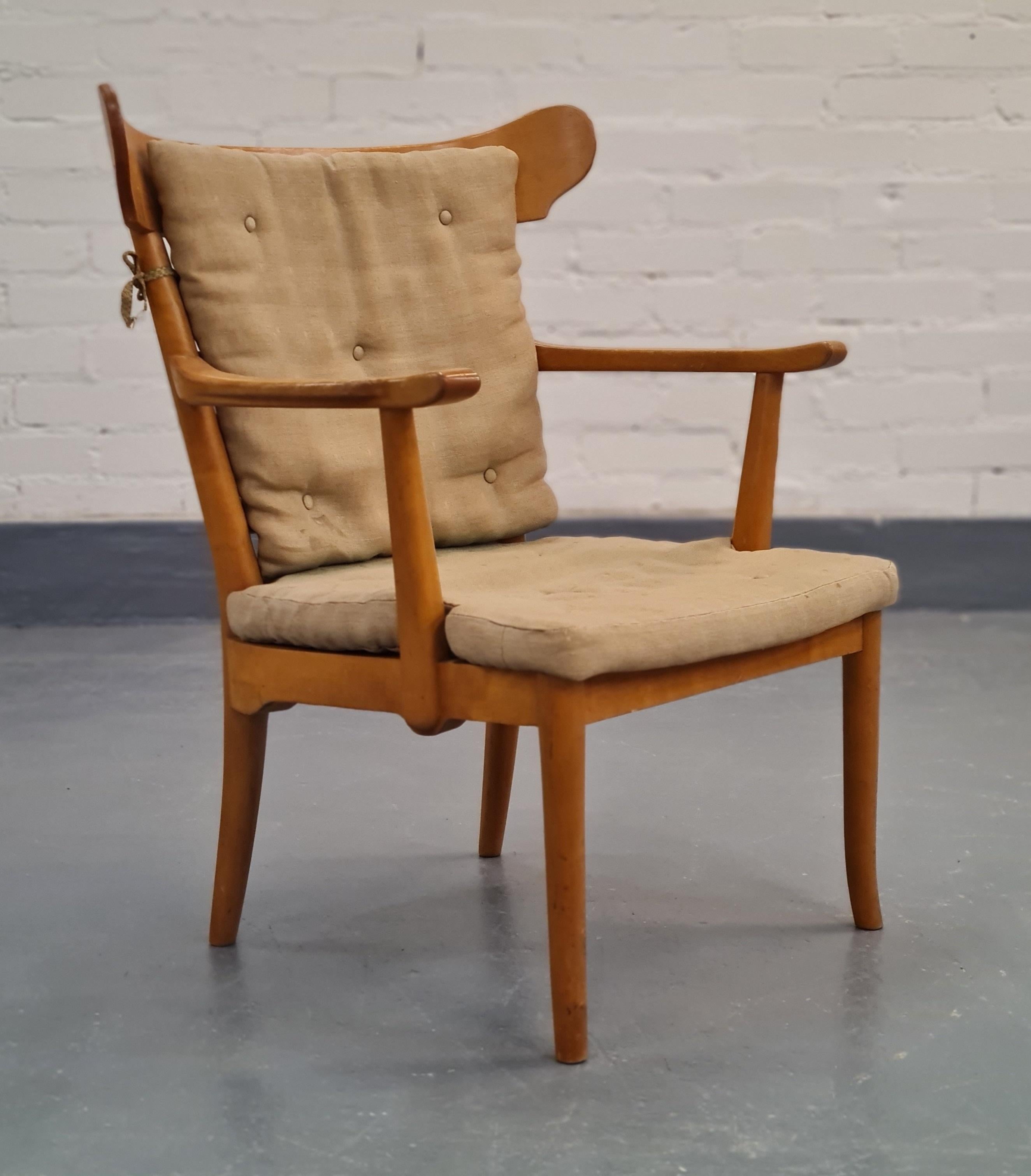 A beautiful 'museum piece' of the rare Carl-Johan Boman 'Astrid' chair that according to the Boman archives has been designed before 1947 with little more information. One thing that was mentioned is that customers could order this chair with the