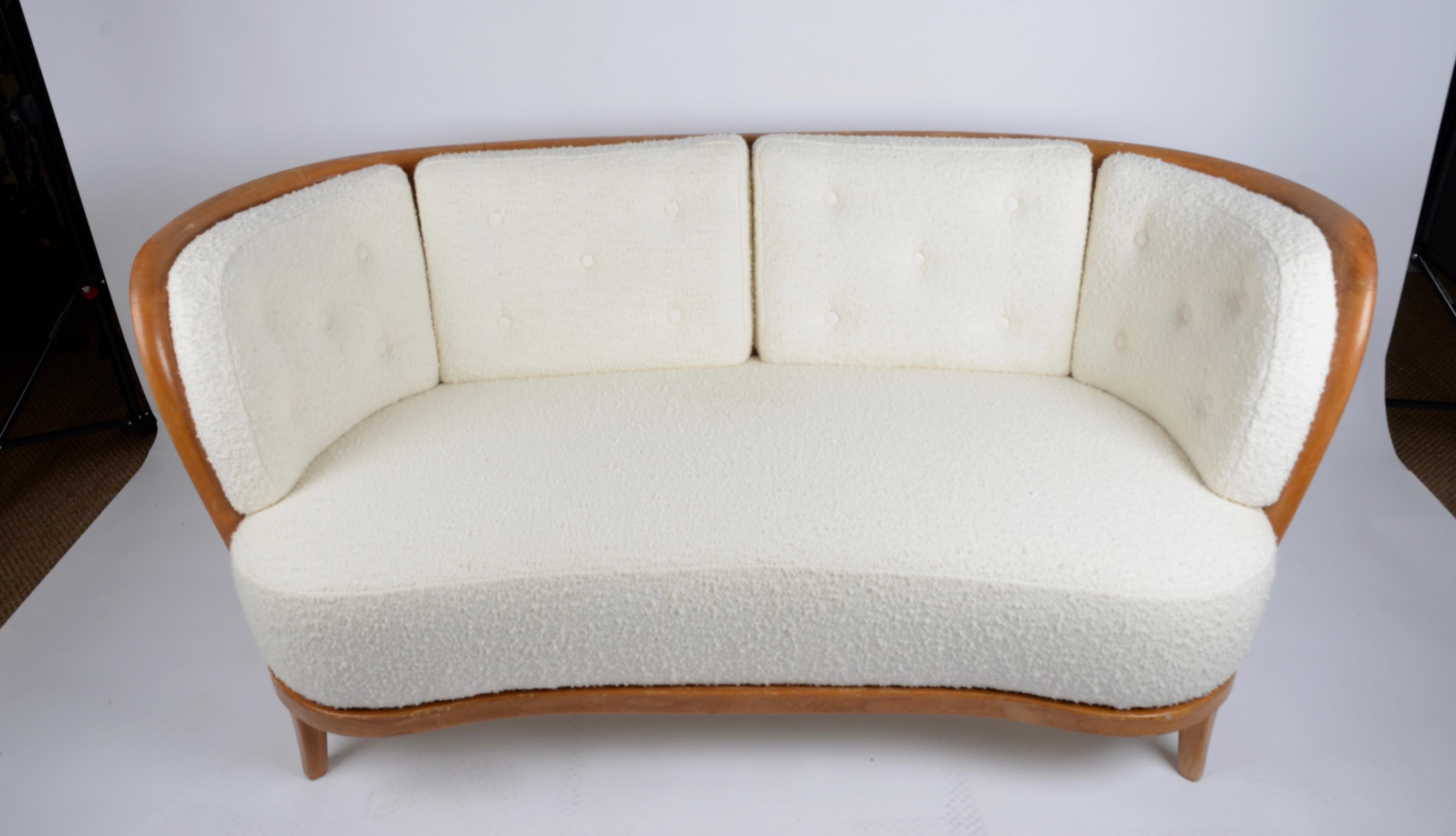 Sofa designed by Carl-Johan Boman for Boman OY. Finland 1930/40s.



Measures: L174, D79, H77 cm.

Signs of age and wear. Reupholstered in boucle´.