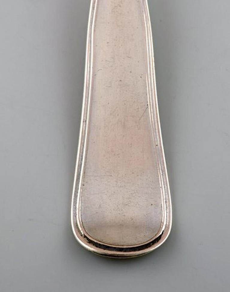 Carl Juul (Aarhus, 1893-1903). Old Danish soup spoon in silver, circa 1900.
In very good condition.
Stamped.
Measures: 18.5 cm.
5 pieces in stock.