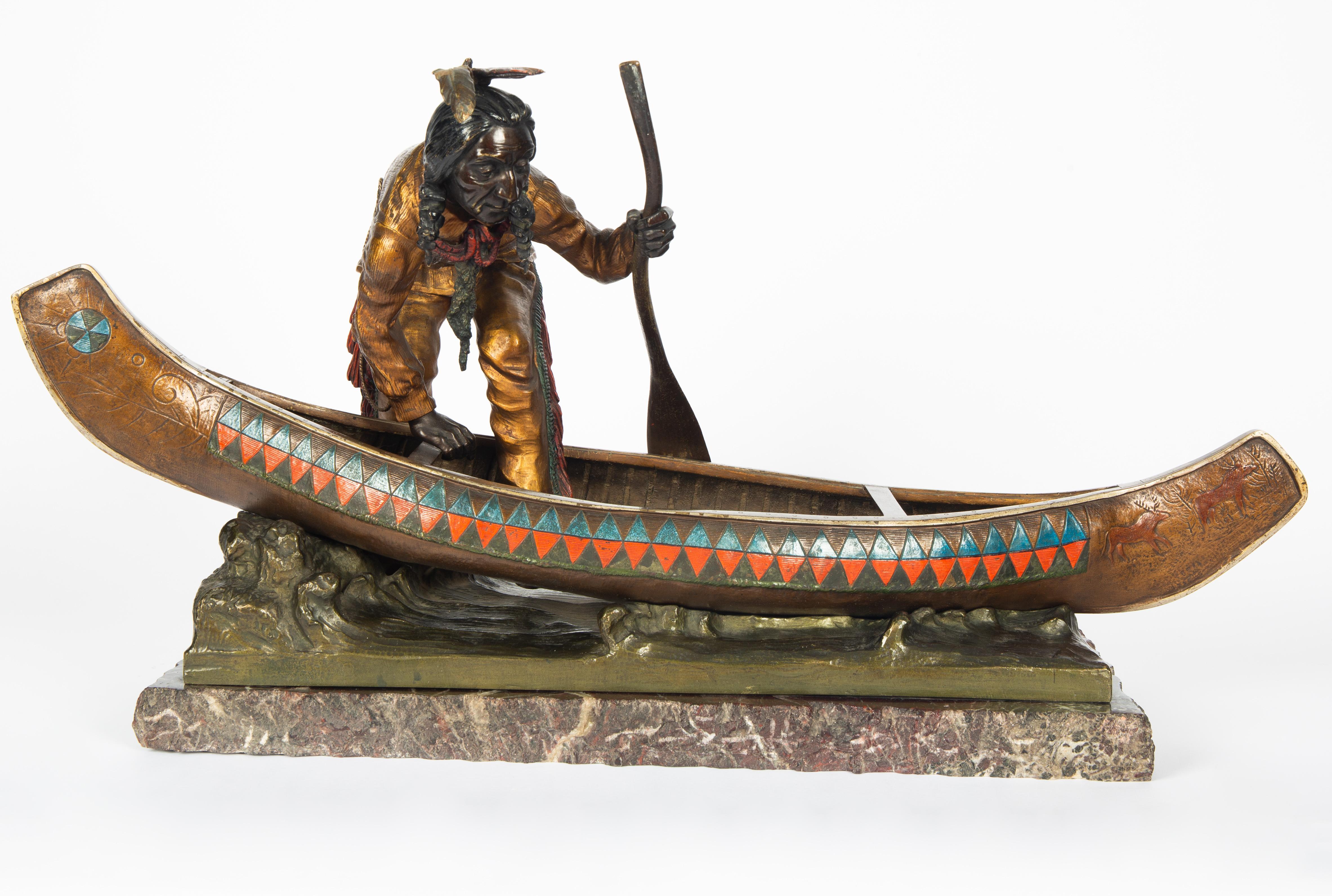 Carl Kauba Figurative Sculpture - A Native American Stepping Into His Canoe