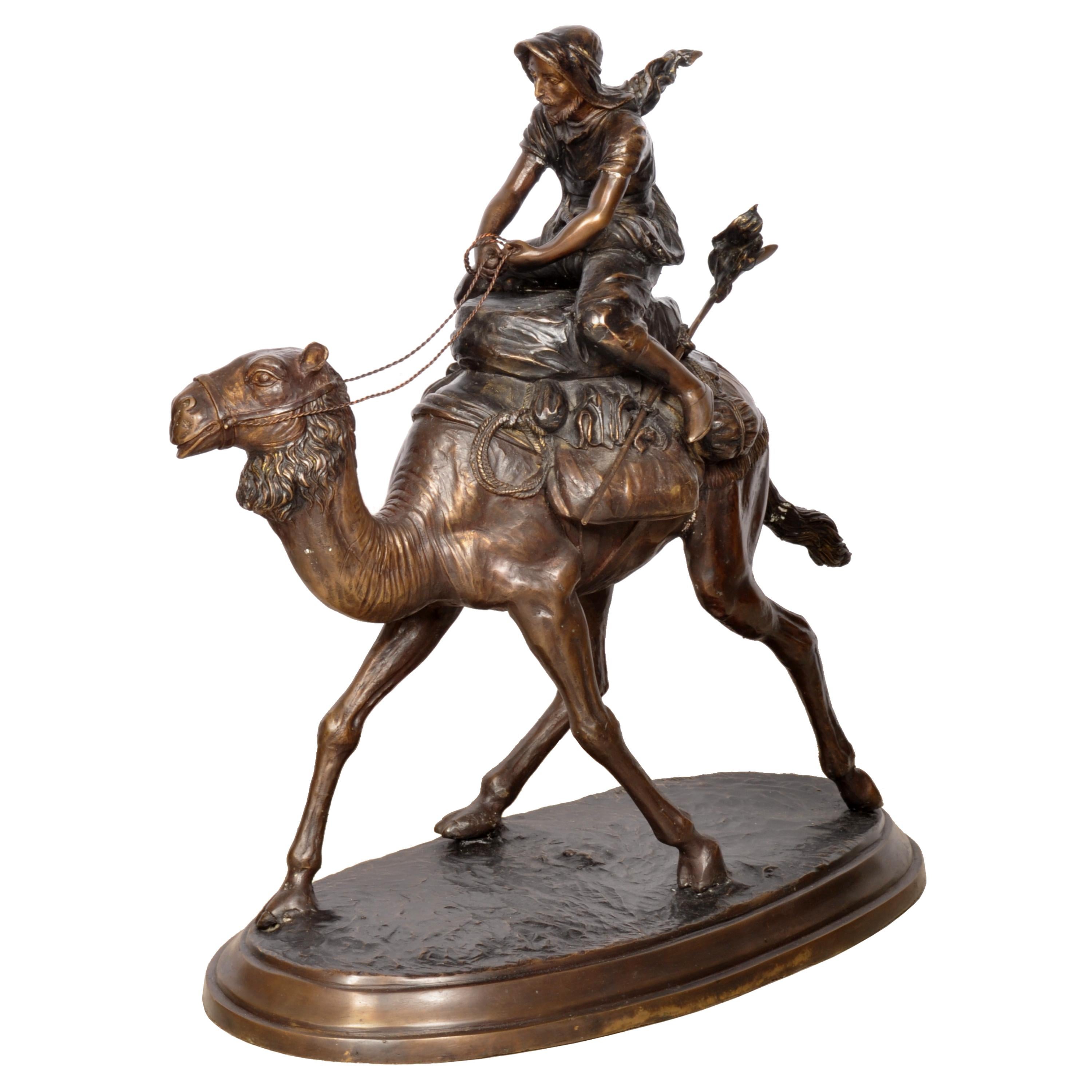 A large cast Vienna bronze in the Orientalist style by the Austrian sculptor Carl Kauba (1865-1922).
The bronze finely modeled as an Arabian dromedary camel with a rider astride, possibly representing T. E. Lawrence ( Lawrence of Arabia). 
The