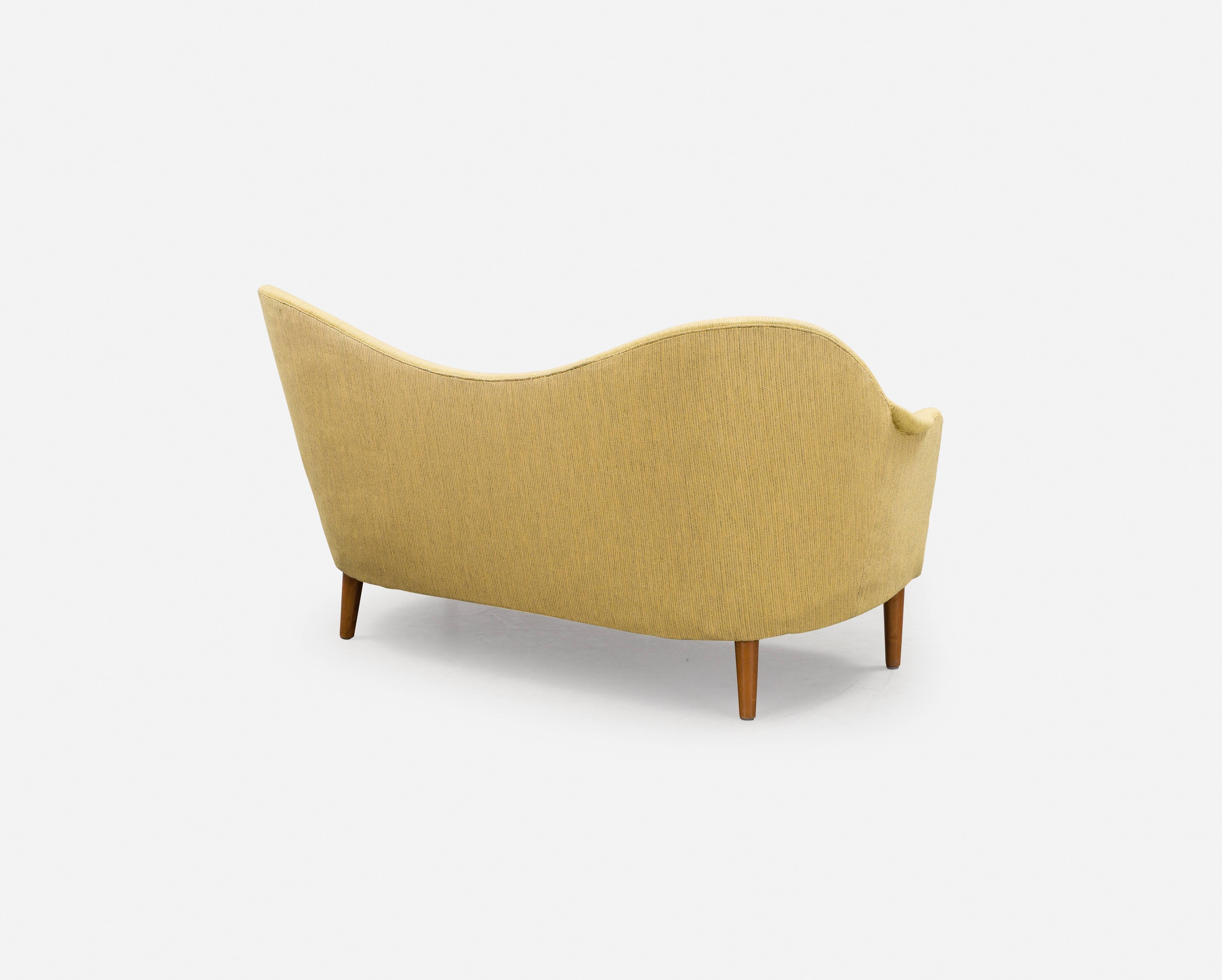 Mid-Century Modern Carl Malmsten curved yellow Samspel sofa / loveseat, mid 20th Century, Sweden.